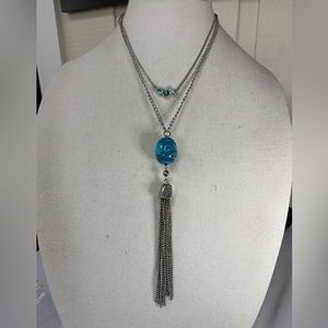 Three silvertone and blue accent necklaces